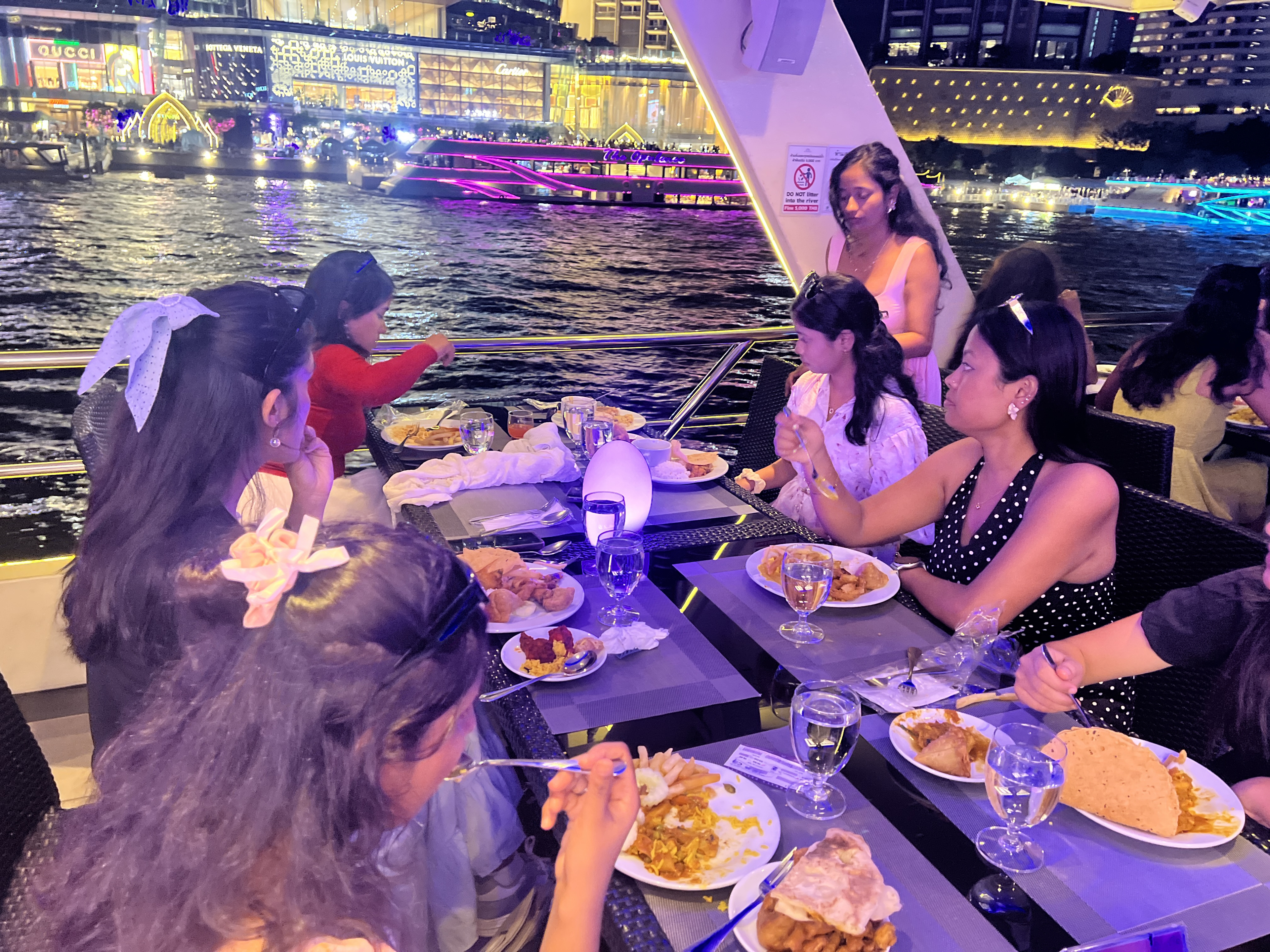 Students enjoying a dinner outing during the trip